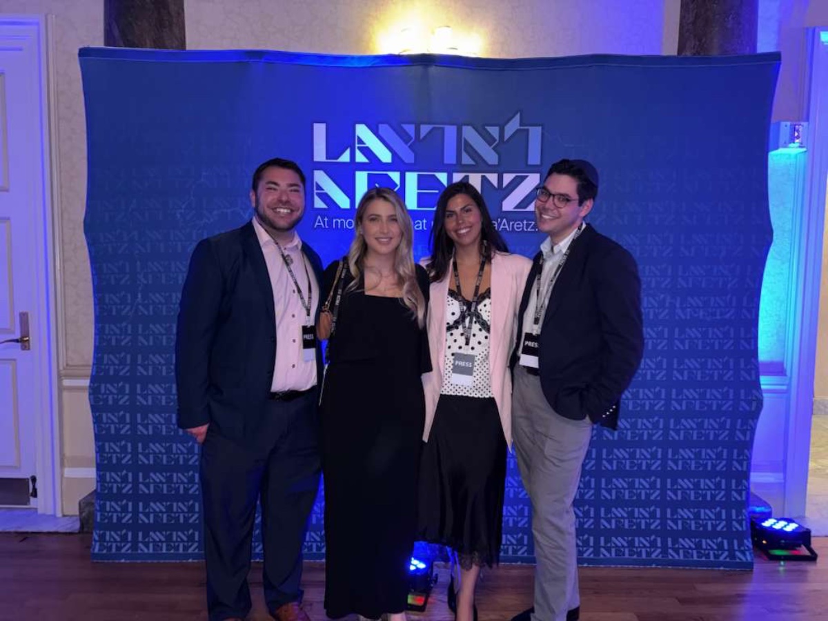 Noyse team with press credentials at a client conference